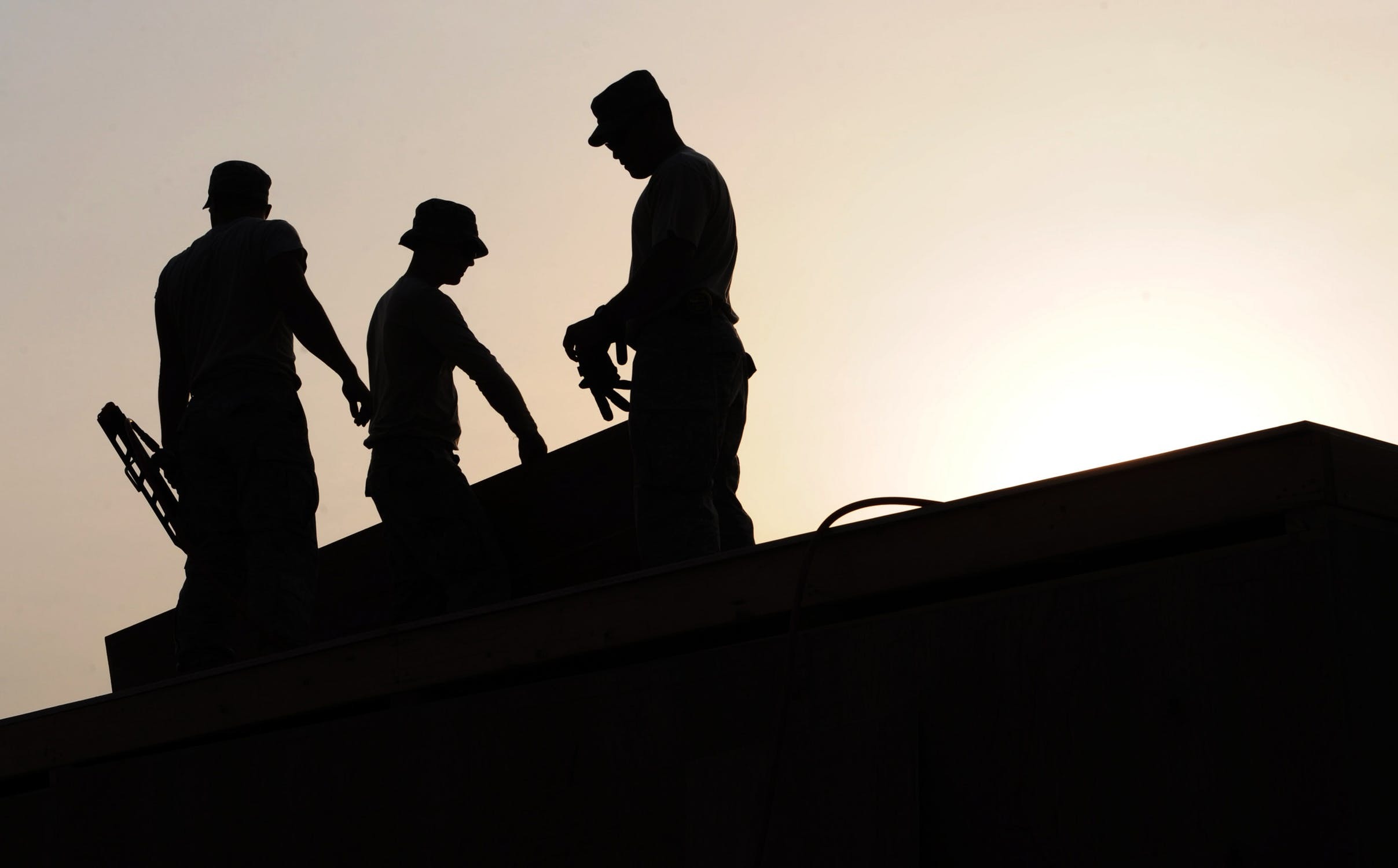 workers-construction-site-hardhats-38293.jpeg#asset:1119